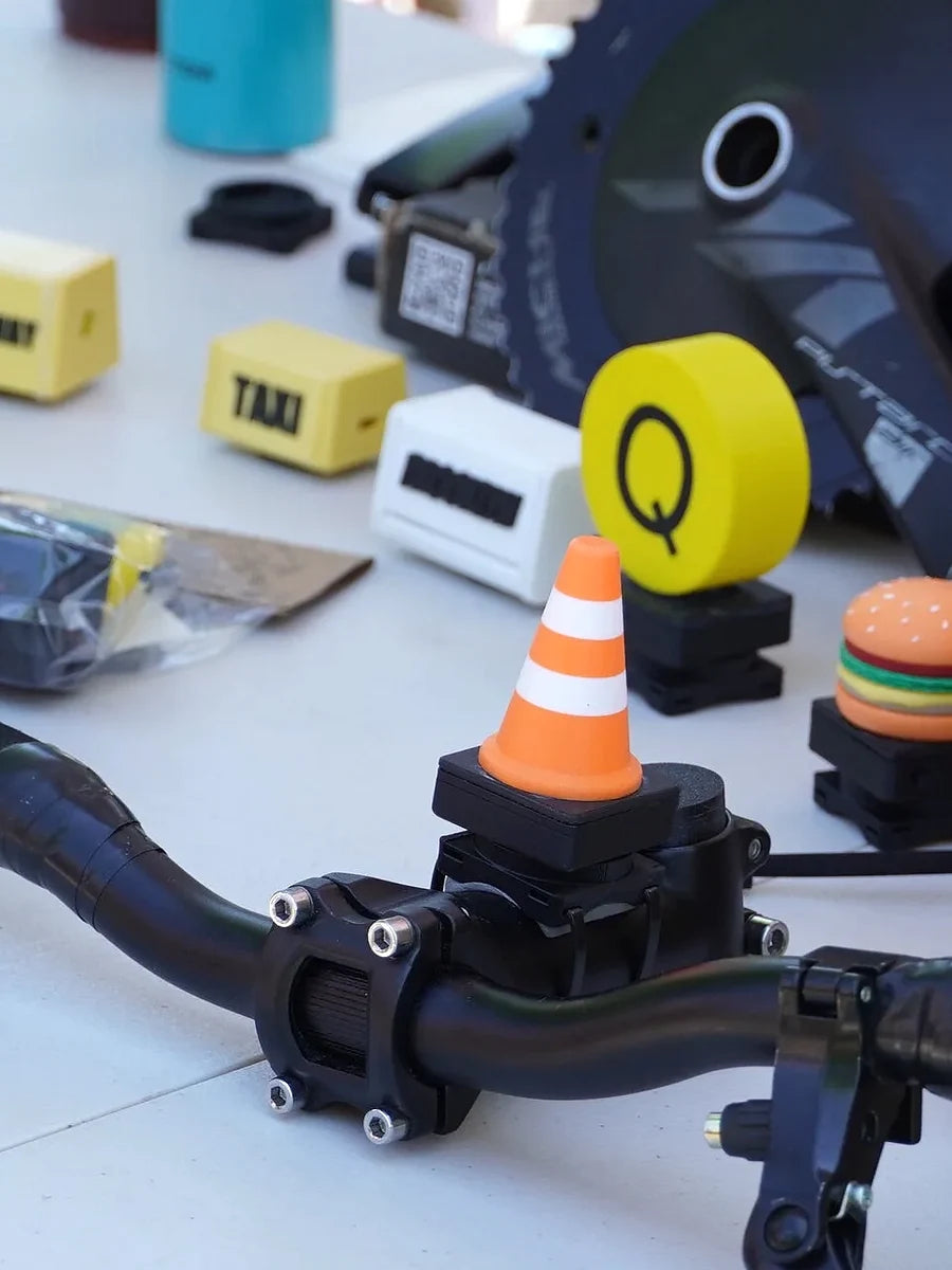 Bike Buddy Cone mounted on a bicycle handlebar with STEMMA accessories