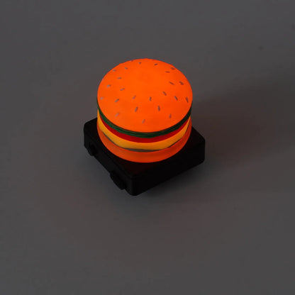 Bike Buddy Burger glowing at night
